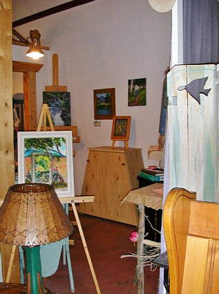 Mid Area with selection of landscape paintings by Terry Henrie